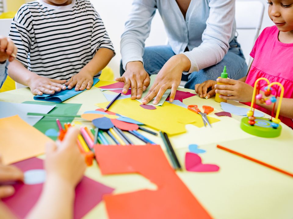 Children learning with a caring therapist at Hope Child Development Centre, Pune